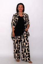 Load image into Gallery viewer, 8032 Black Abstract &amp; 7972  Pants &amp; 7919 Black Hi-Low Top
